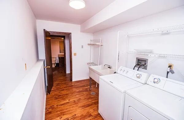 a bathroom with a toilet and a sink