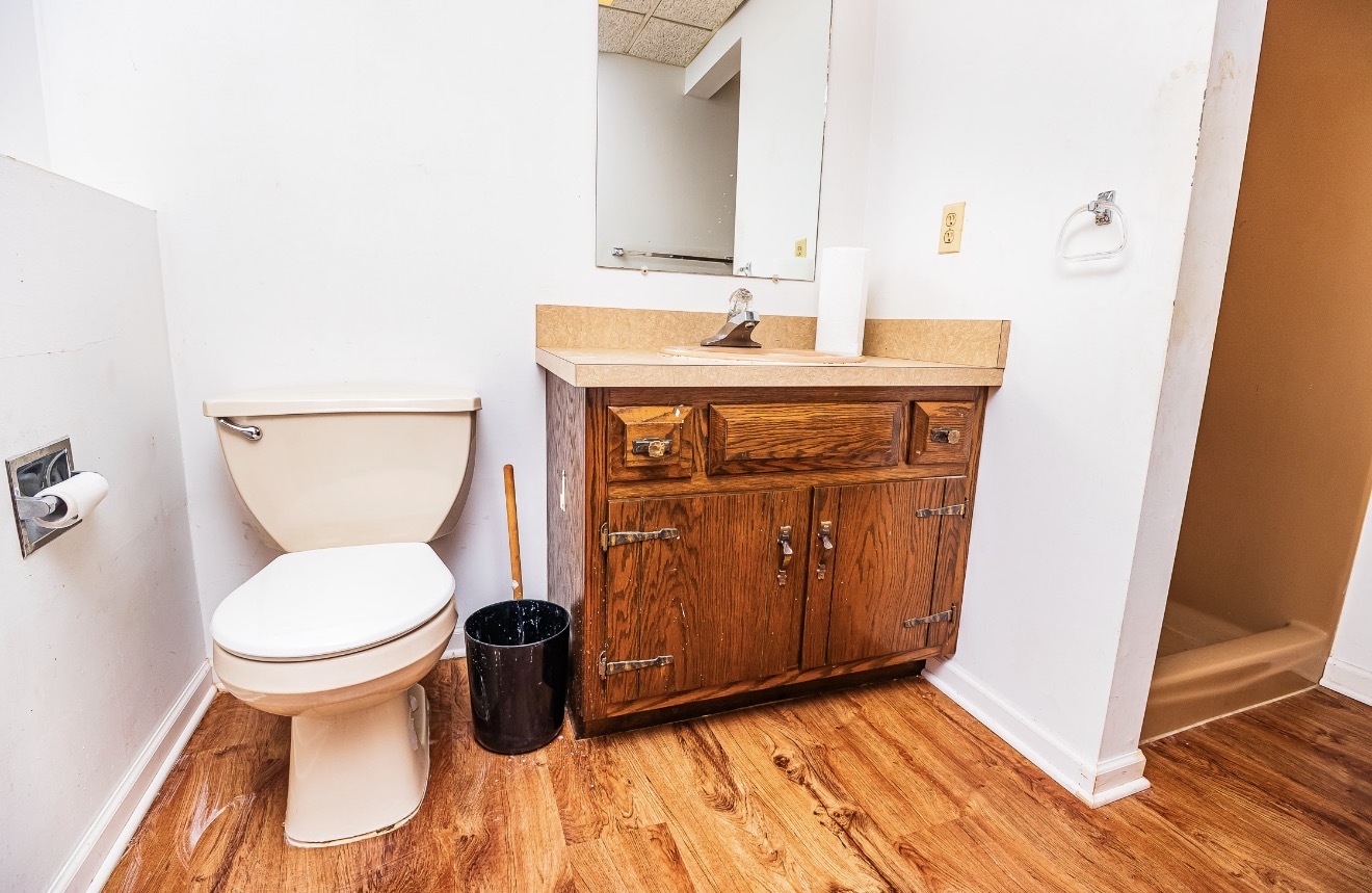 911 Colonade Road Shorewood, IL 60404 - Photo 27 of 36 a bathroom with a toilet and a sink