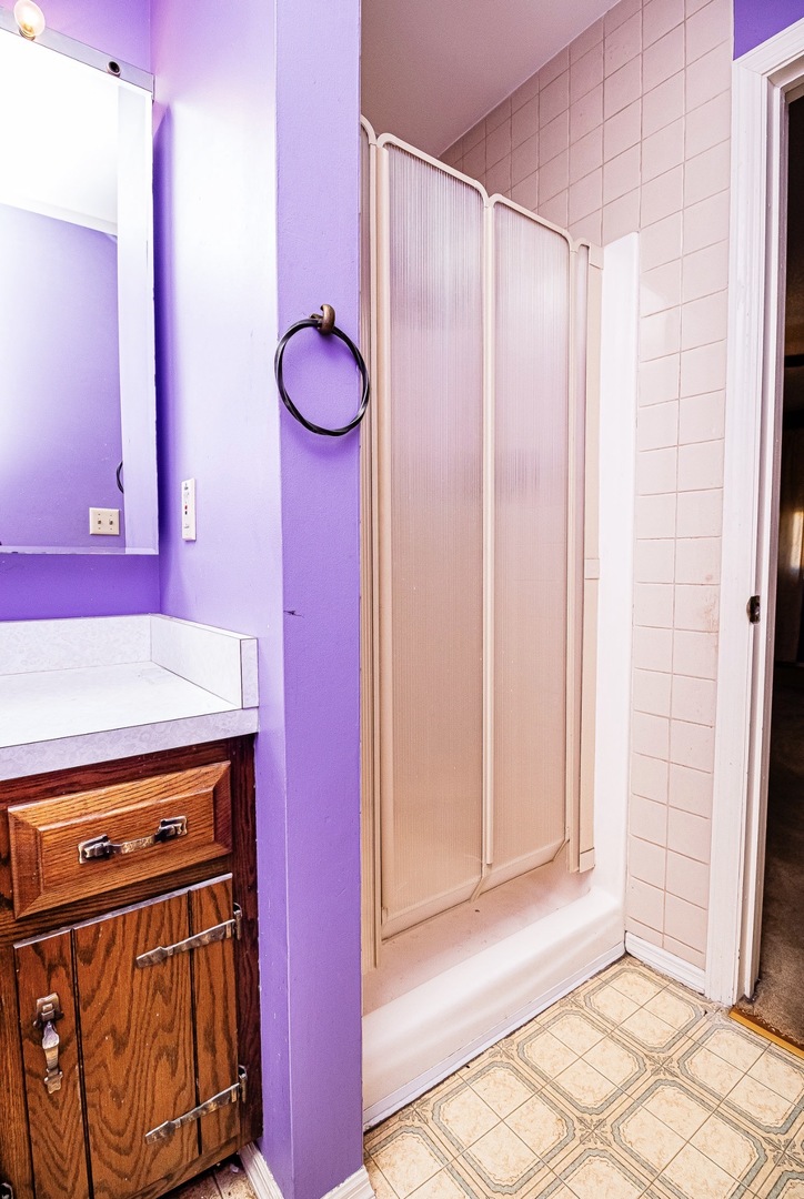 911 Colonade Road Shorewood, IL 60404 - Photo 34 of 36 a view of a room with wooden floor and windows