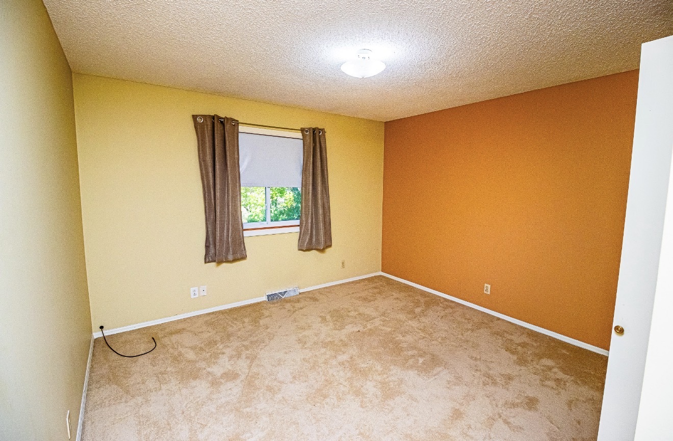 911 Colonade Road Shorewood, IL 60404 - Photo 35 of 36 an empty room with windows