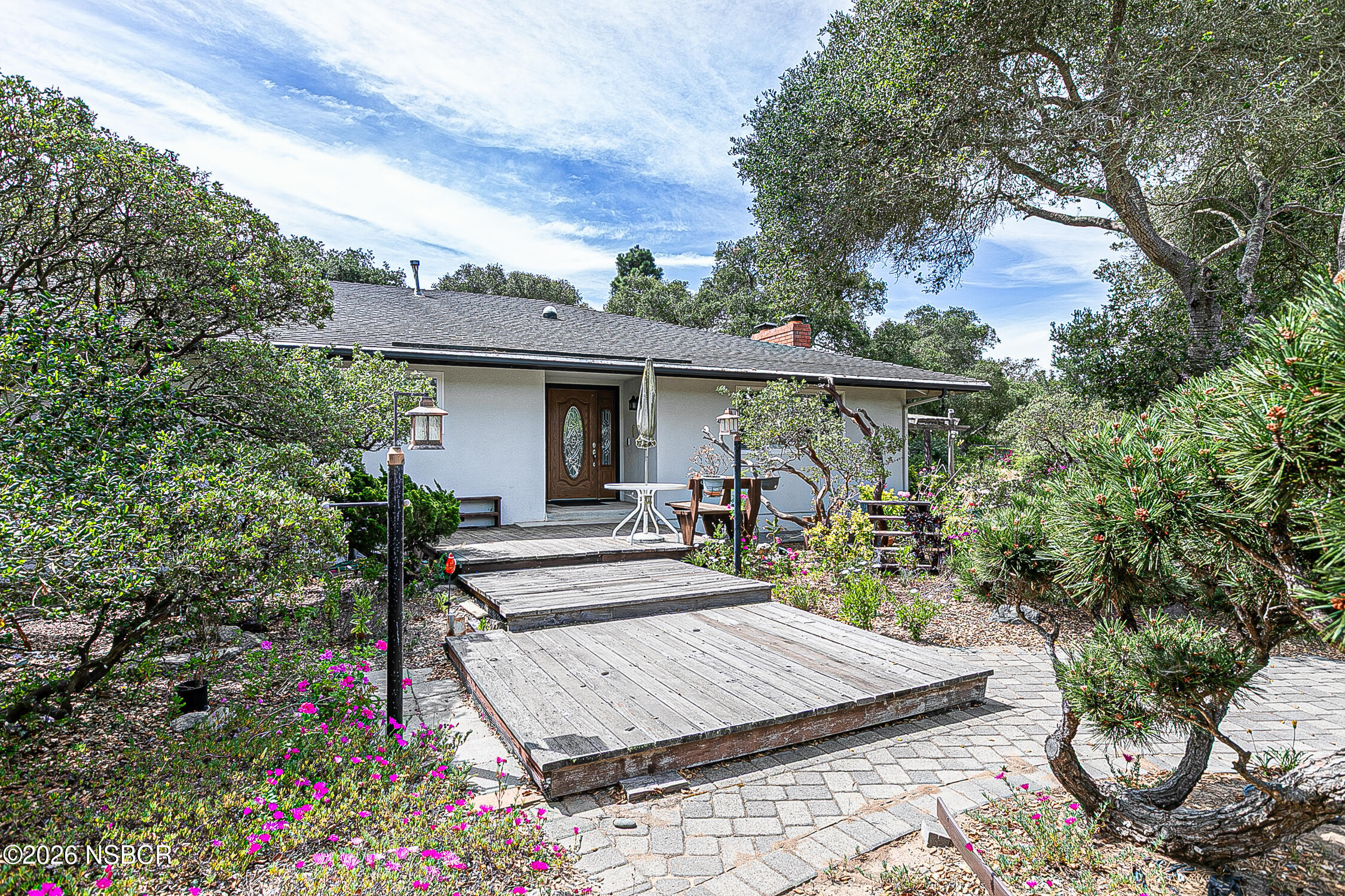 1260 Onstott Road Lompoc, CA 93436 - Photo 6 of 52 a view of a backyard with plants and a patio