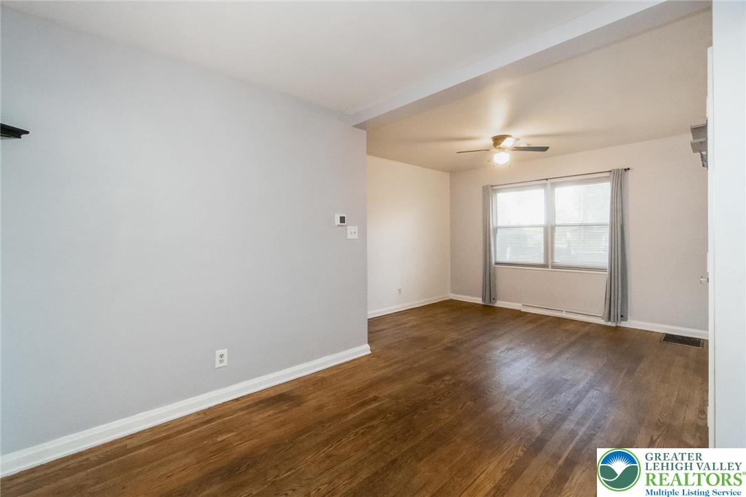 240 Palmer Street Easton, PA 18042 - Photo 11 of 37 wooden floor in an empty room with a window