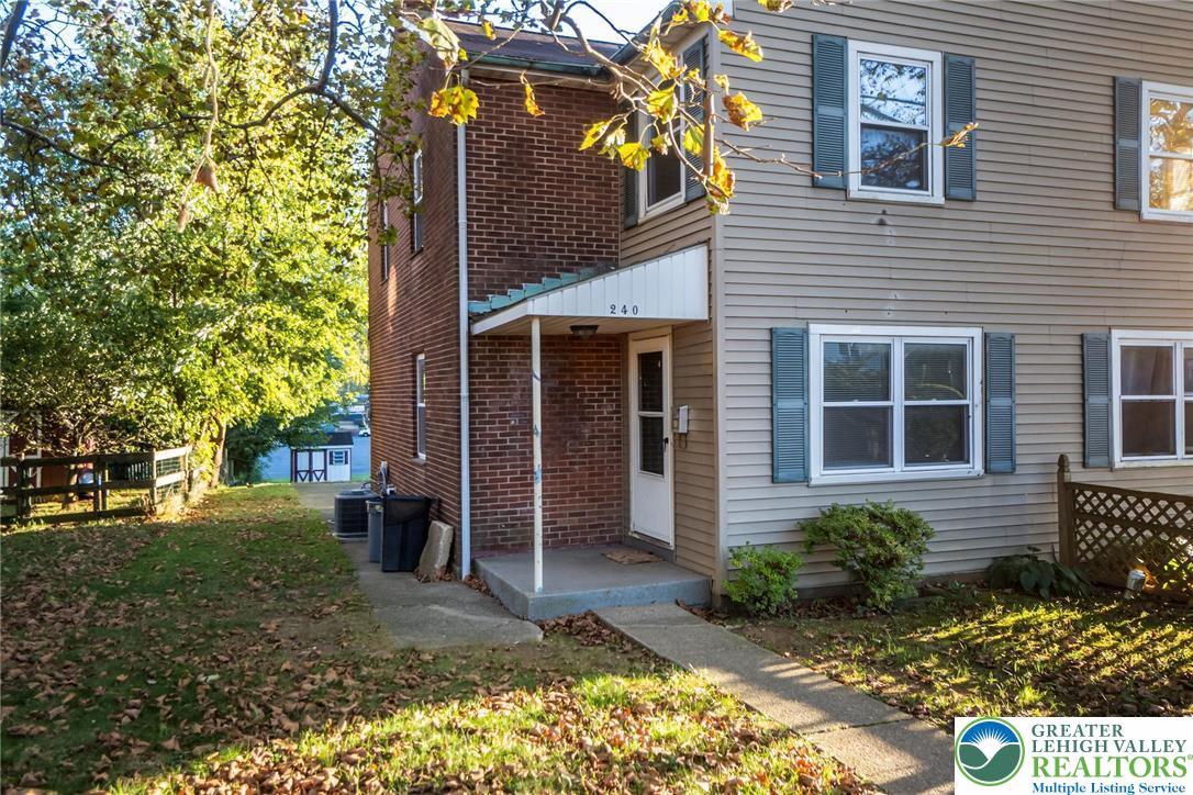 240 Palmer Street Easton, PA 18042 - Photo 2 of 37 a front view of a house with garden