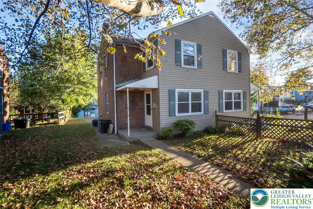 240 Palmer Street Easton, PA 18042 - Photo 4 of 37 a front view of a house with a garden