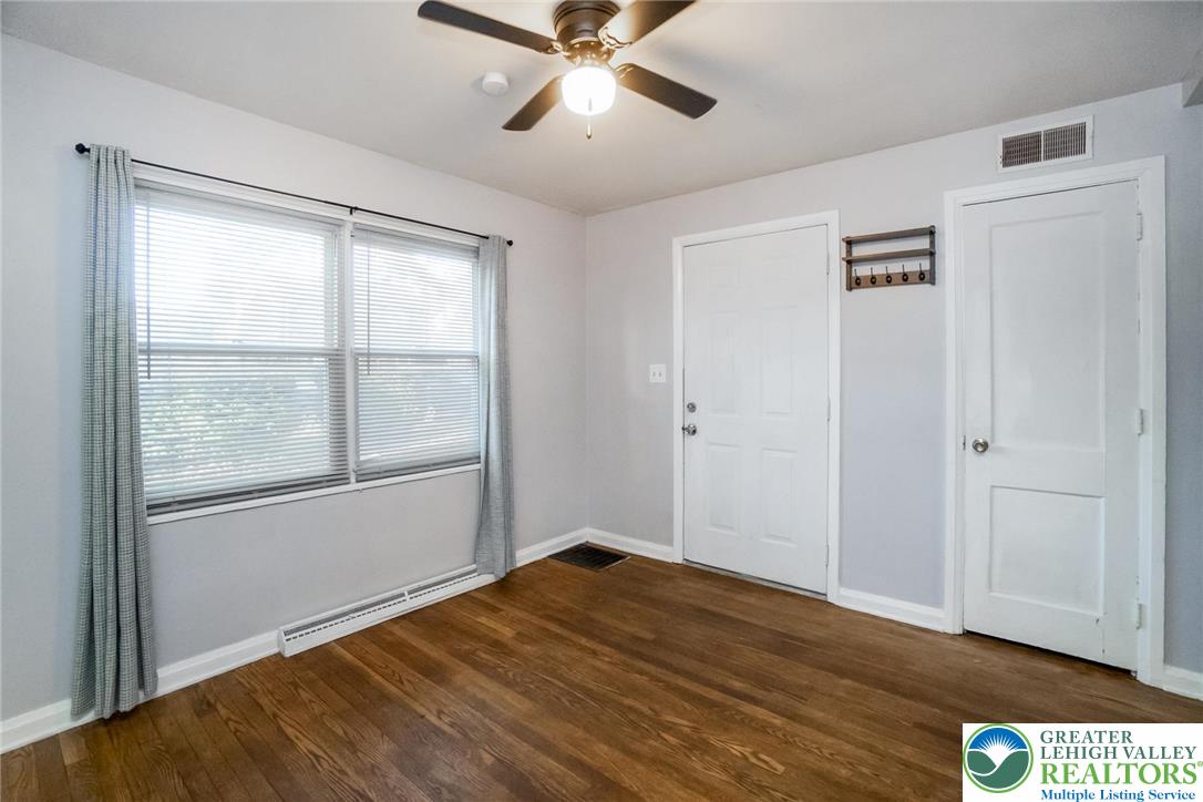 240 Palmer Street Easton, PA 18042 - Photo 8 of 37 a view of empty room with wooden floor and fan