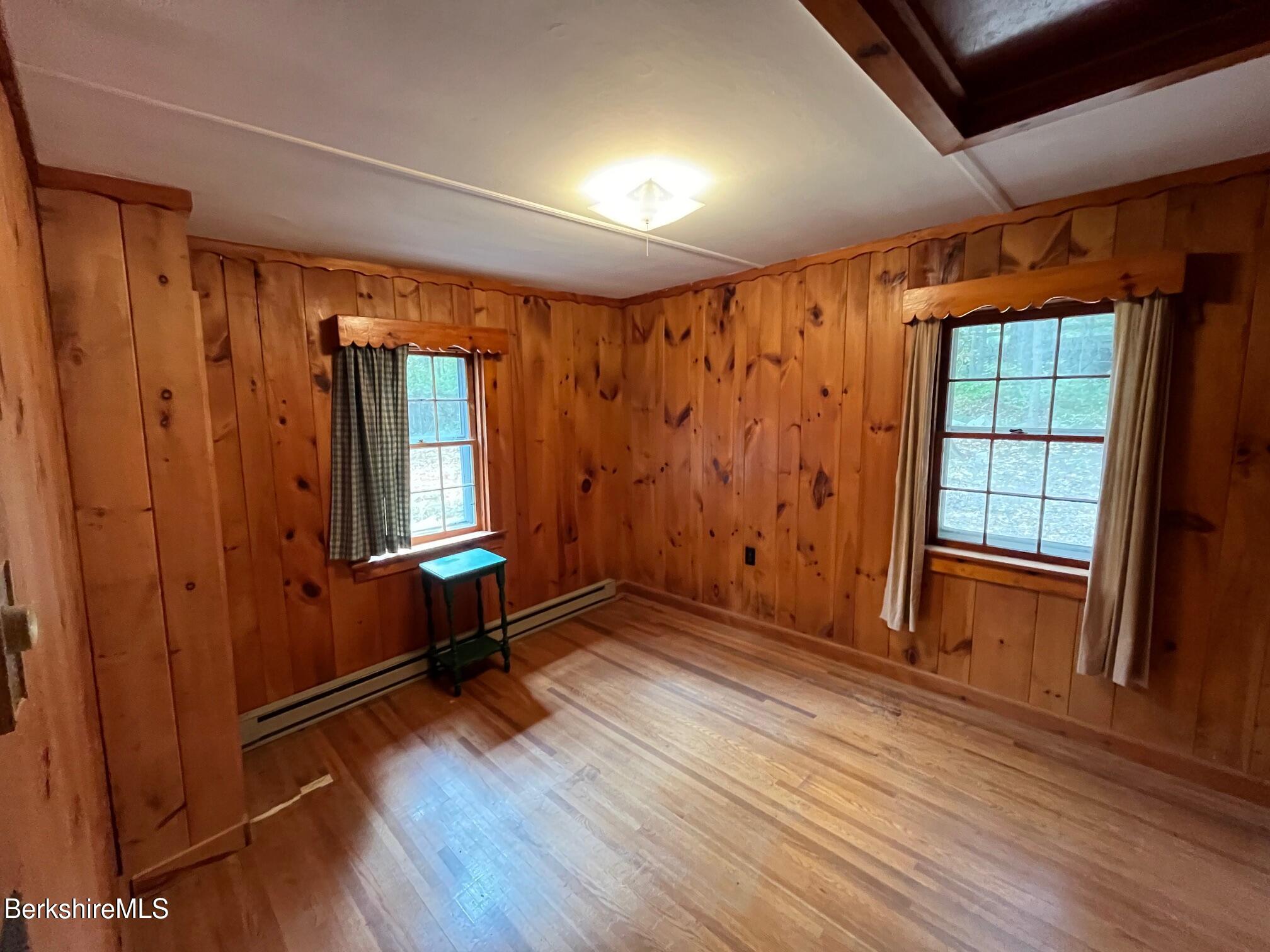 33 Pine Road New Marlborough, MA 01230 - Photo 7 of 11 wooden floor in an empty room with a window