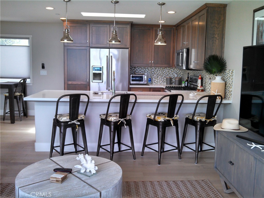 2500 Main Street Morro Bay, CA 93442 - Photo 2 of 9 a view of kitchen with dining table and chairs
