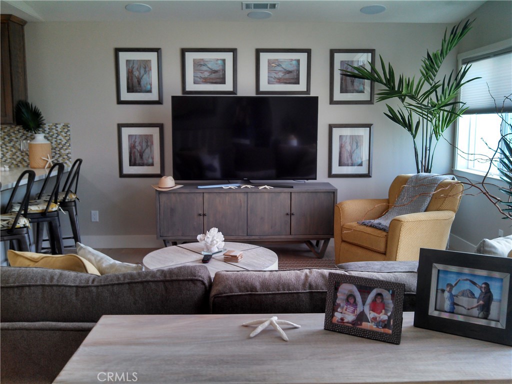 2500 Main Street Morro Bay, CA 93442 - Photo 3 of 9 a living room with furniture and a flat screen tv