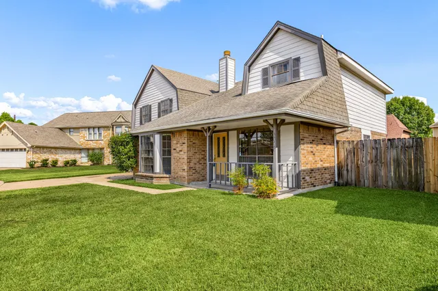 a front view of house with yard