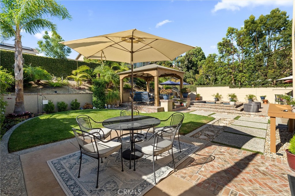 2440 Highwood Road Orange, CA 92867 - Photo 48 of 53 a view of a backyard with sitting area