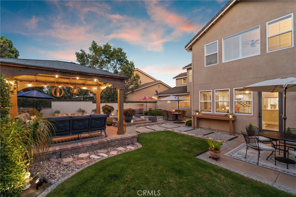 2440 Highwood Road Orange, CA 92867 - Photo 5 of 53 a view of a house with backyard sitting area and garden