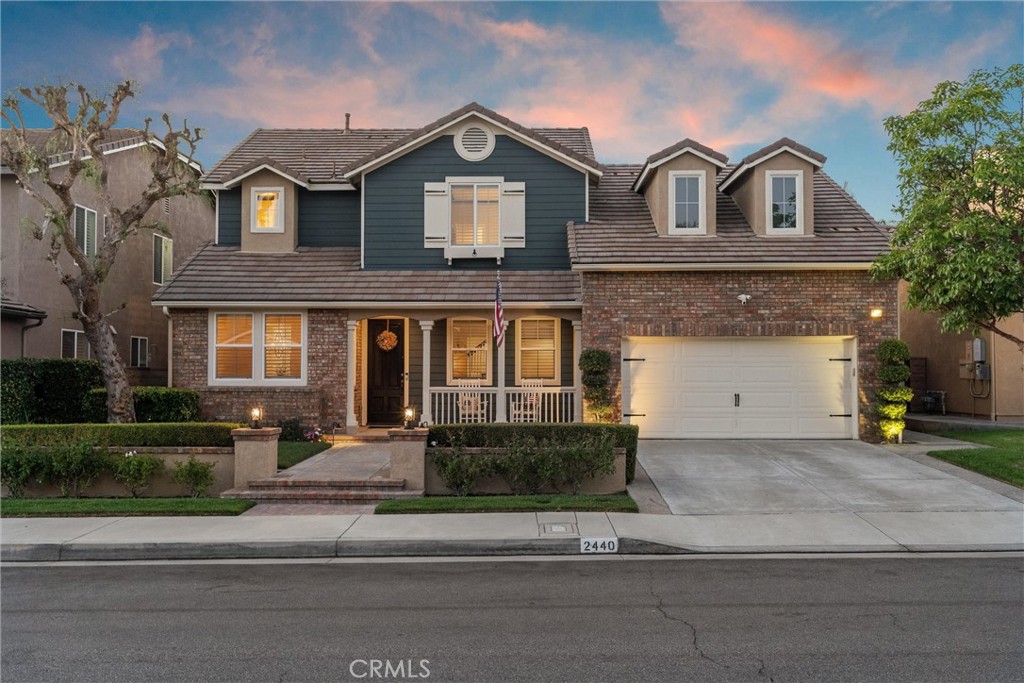 2440 Highwood Road Orange, CA 92867 - Photo 7 of 53 front view of a house with a yard