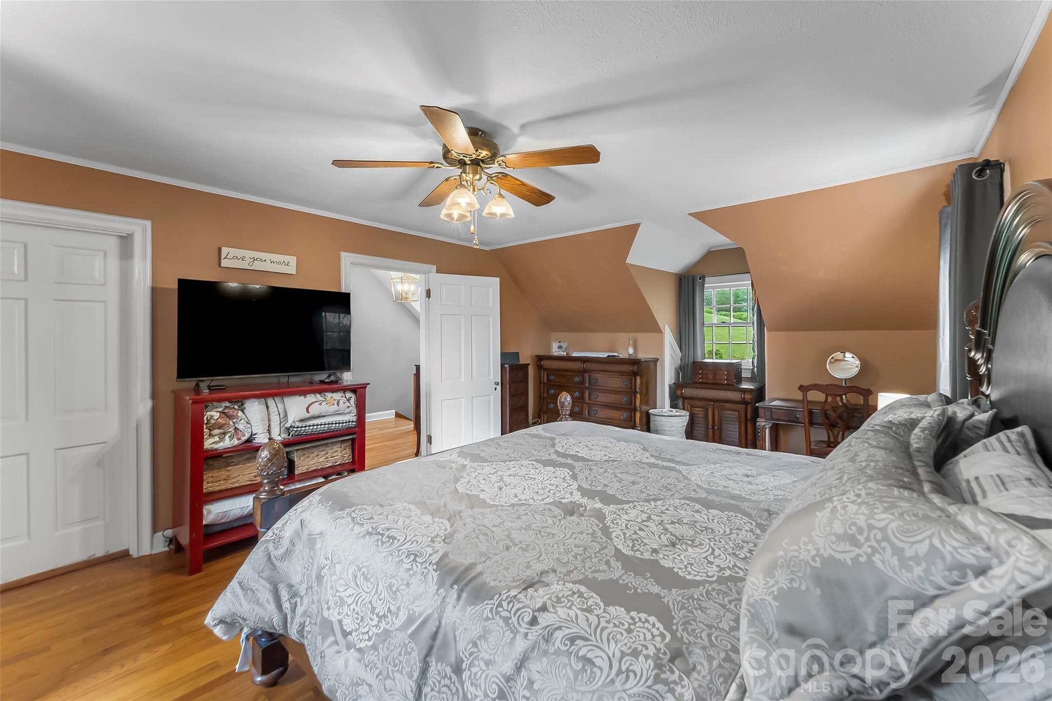 9 Crescent Drive Marion, NC 28752 - Photo 18 of 35 a bedroom with a bed and a flat screen tv