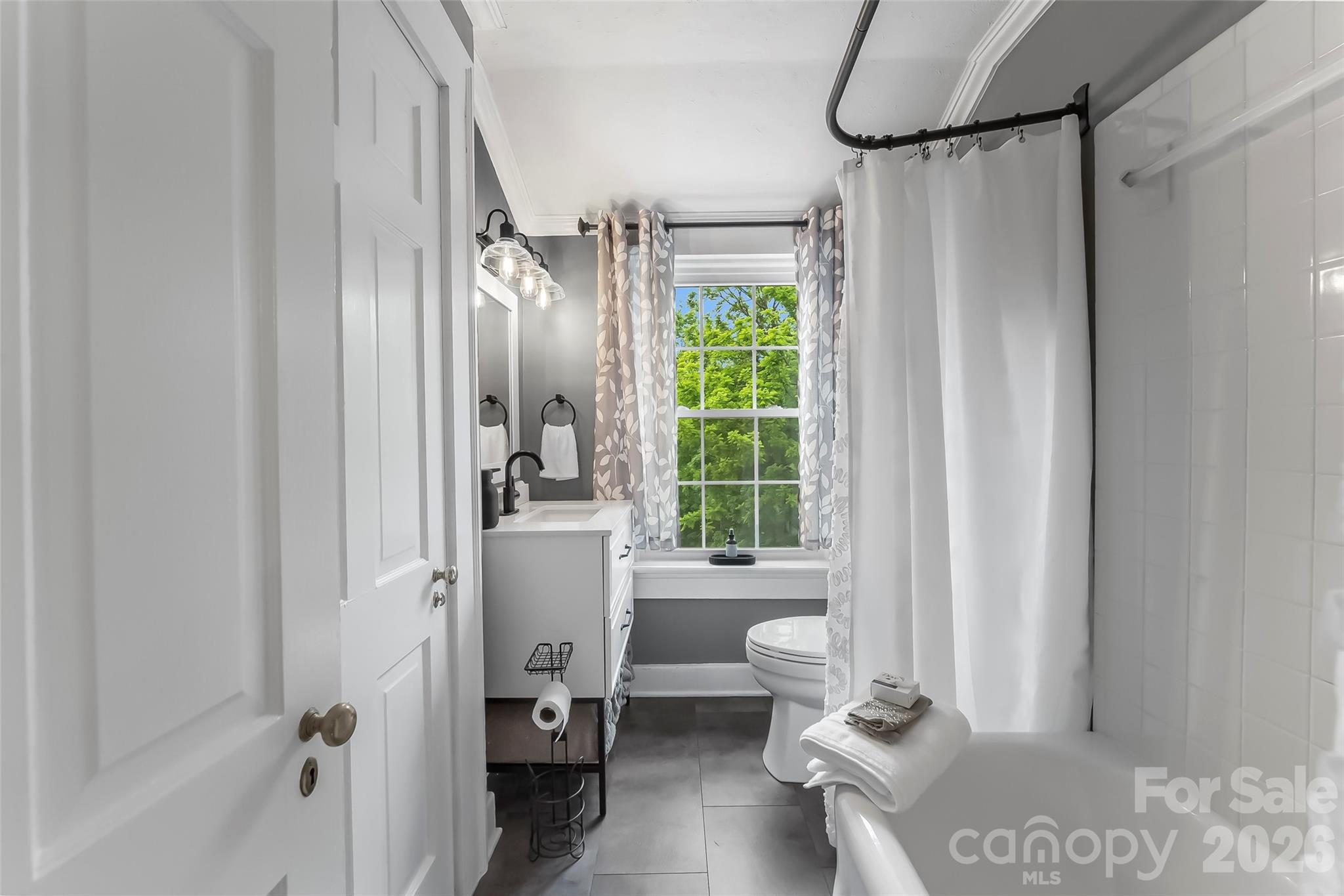 9 Crescent Drive Marion, NC 28752 - Photo 21 of 35 a bathroom with a granite countertop sink a toilet and shower