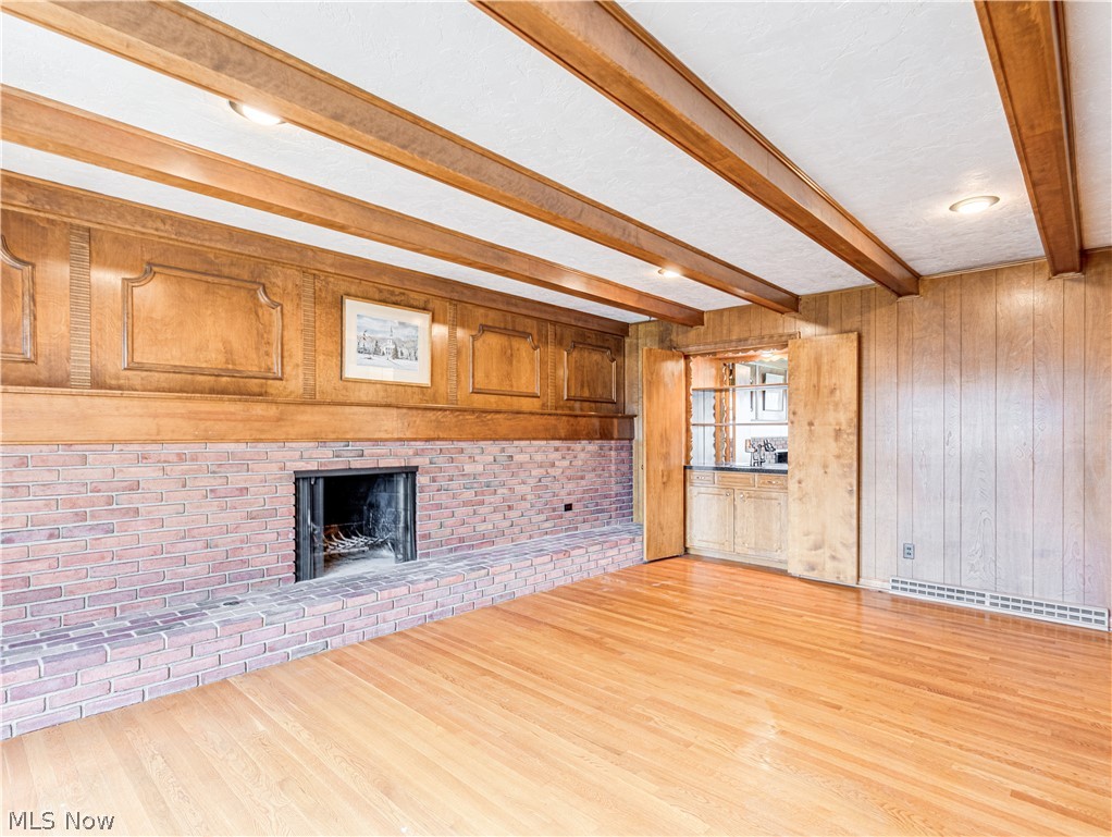 2015 Larchmont Road Akron, OH 44313 - Photo 9 of 29 Coziest family room with beamed ceiling, fireplace and wet bar