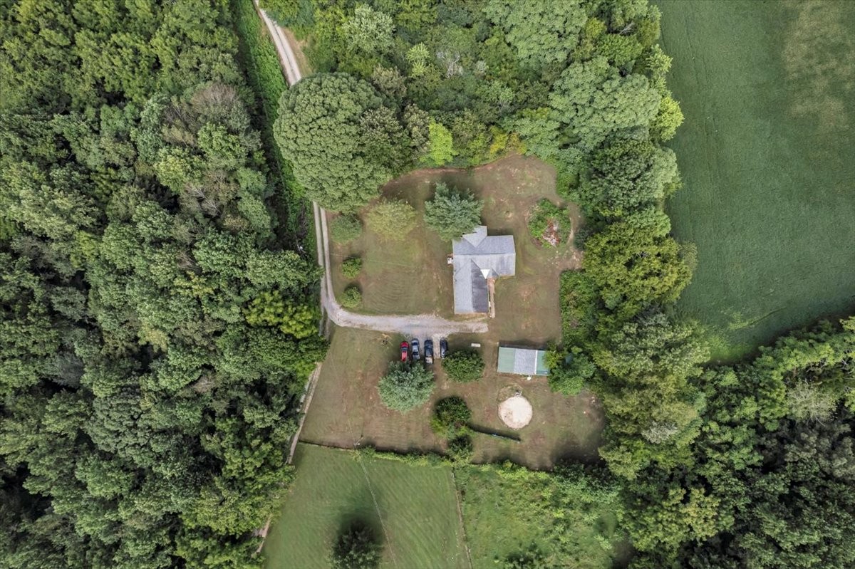 413 Walden Ridge Road Manchester, TN 37355 - Photo 12 of 71 an aerial view of a house with a yard and trees all around