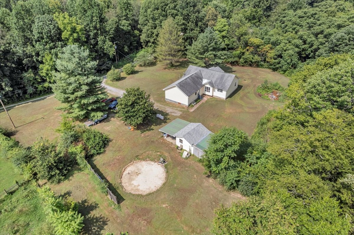 413 Walden Ridge Road Manchester, TN 37355 - Photo 15 of 71 an aerial view of a house with a yard and lake view