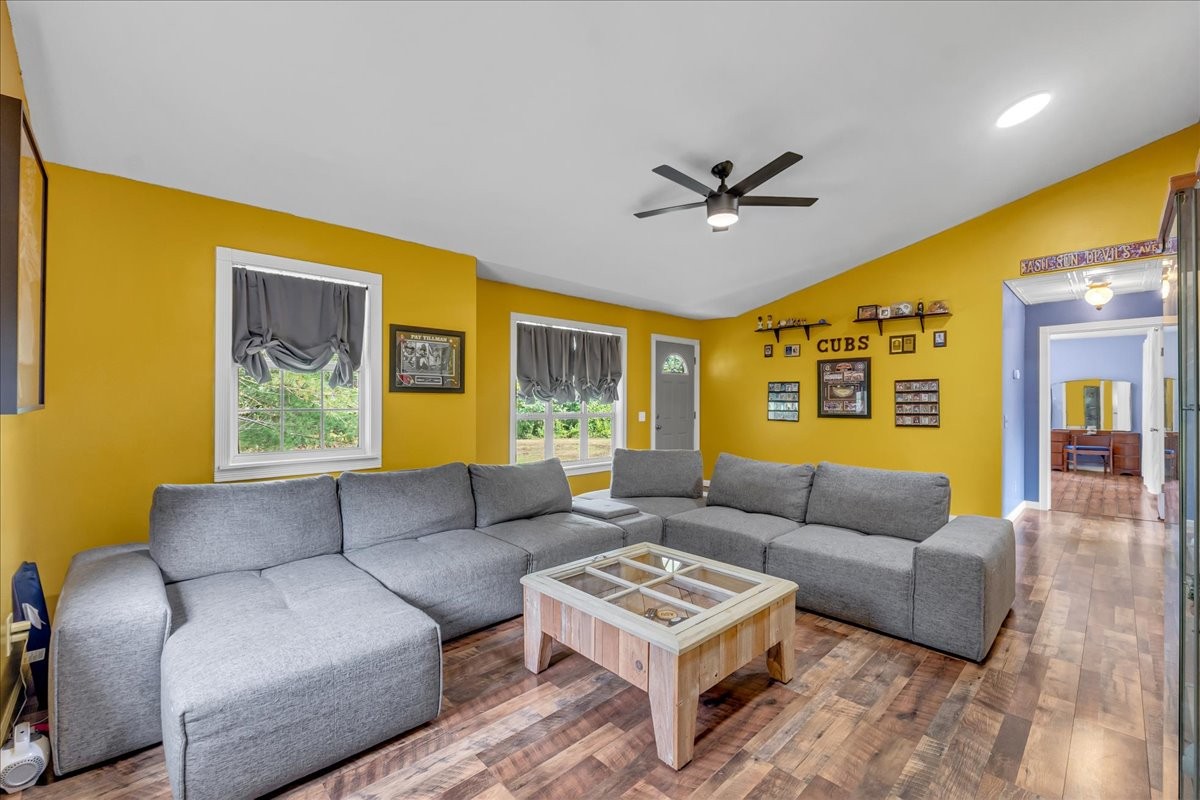 413 Walden Ridge Road Manchester, TN 37355 - Photo 19 of 71 a living room with furniture a ceiling fan and a window