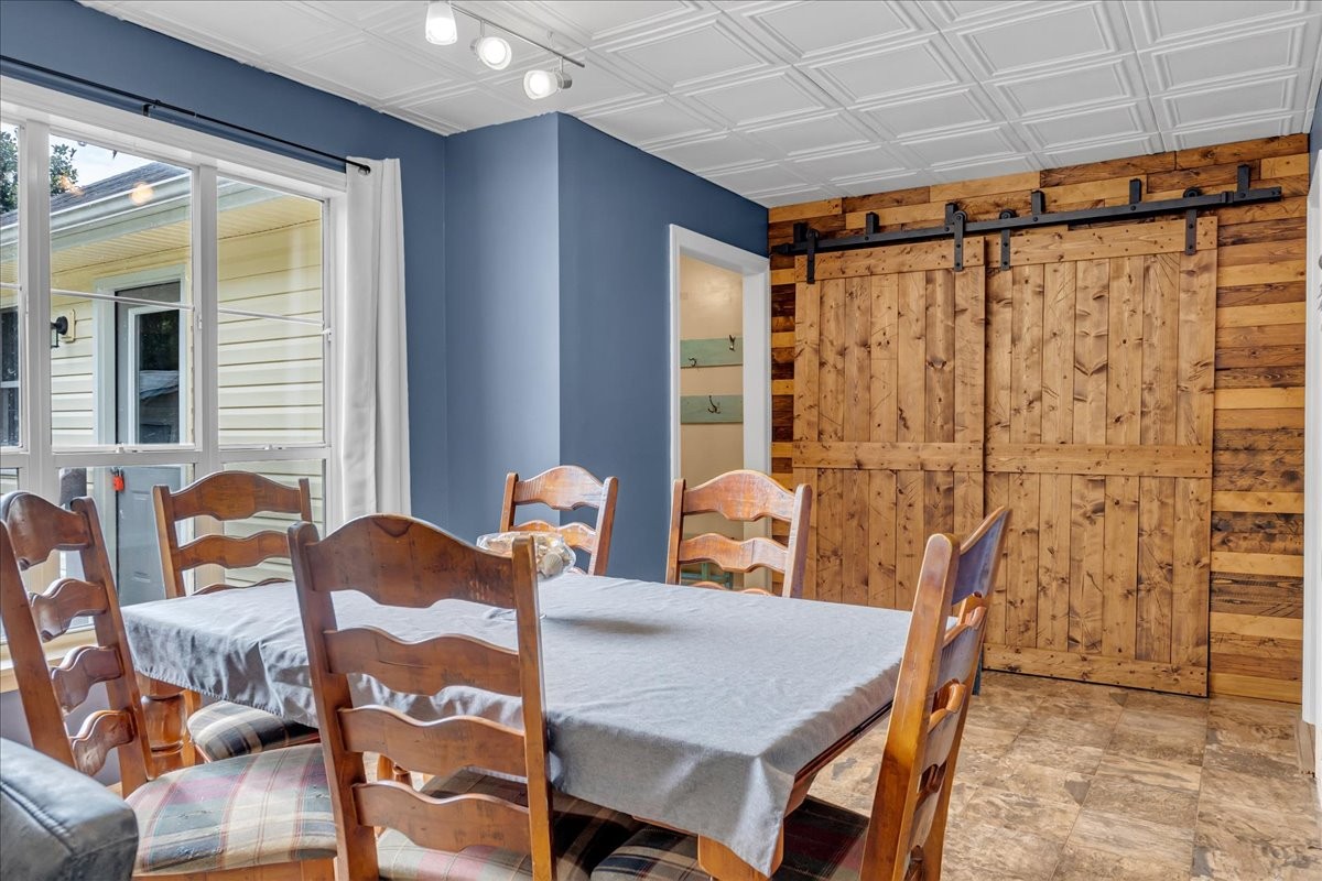 413 Walden Ridge Road Manchester, TN 37355 - Photo 31 of 71 a view of a dining room with furniture and window