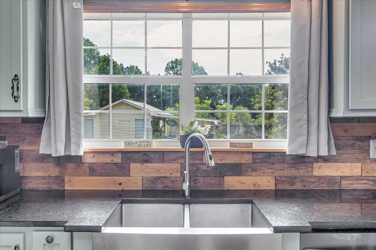 413 Walden Ridge Road Manchester, TN 37355 - Photo 34 of 71 a kitchen with kitchen island a large window in it