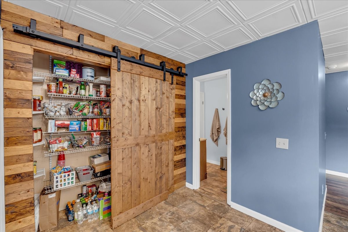 413 Walden Ridge Road Manchester, TN 37355 - Photo 40 of 71 a view of walk in closet with clothes and shoes