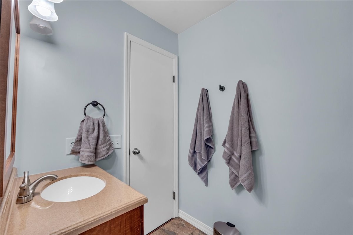 413 Walden Ridge Road Manchester, TN 37355 - Photo 43 of 71 a bathroom with a sink vanity and mirror