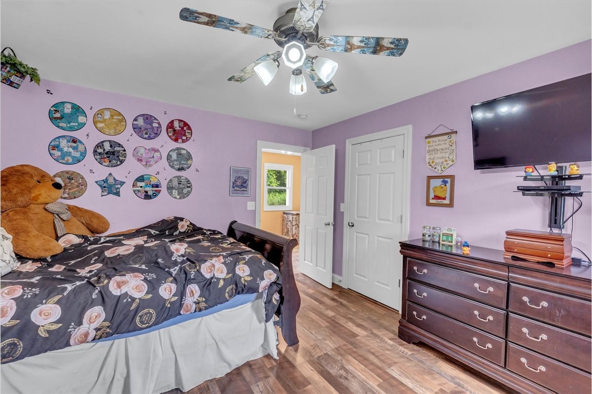 413 Walden Ridge Road Manchester, TN 37355 - Photo 52 of 71 a bedroom with a bed and a dresser in it