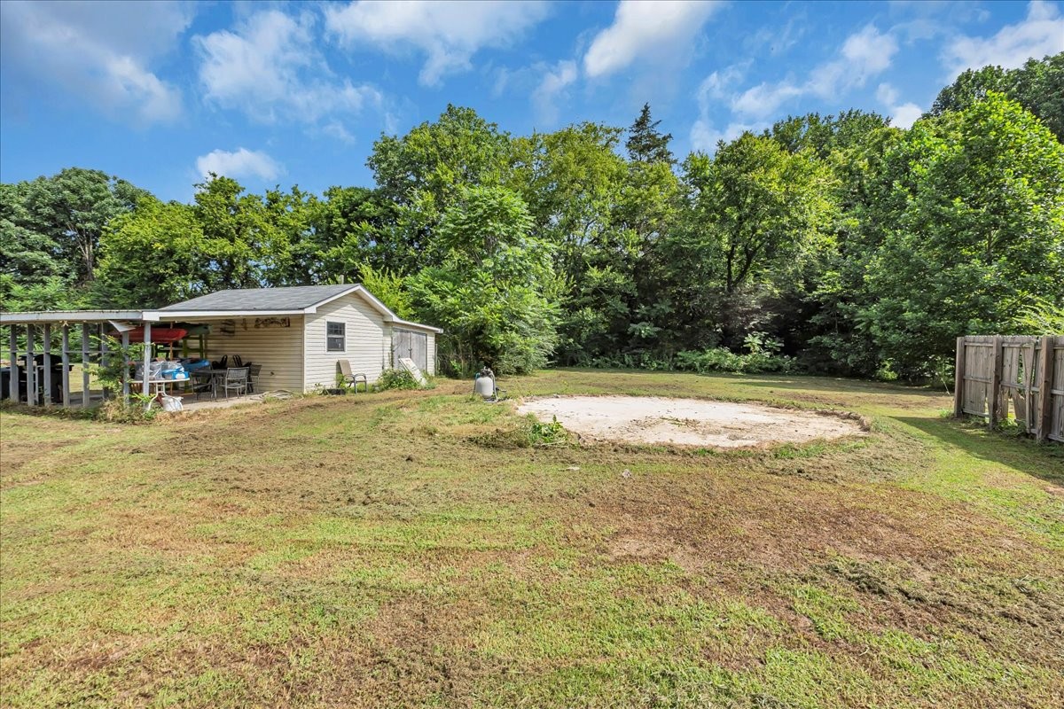 413 Walden Ridge Road Manchester, TN 37355 - Photo 64 of 71 a swimming pool with wooden fence