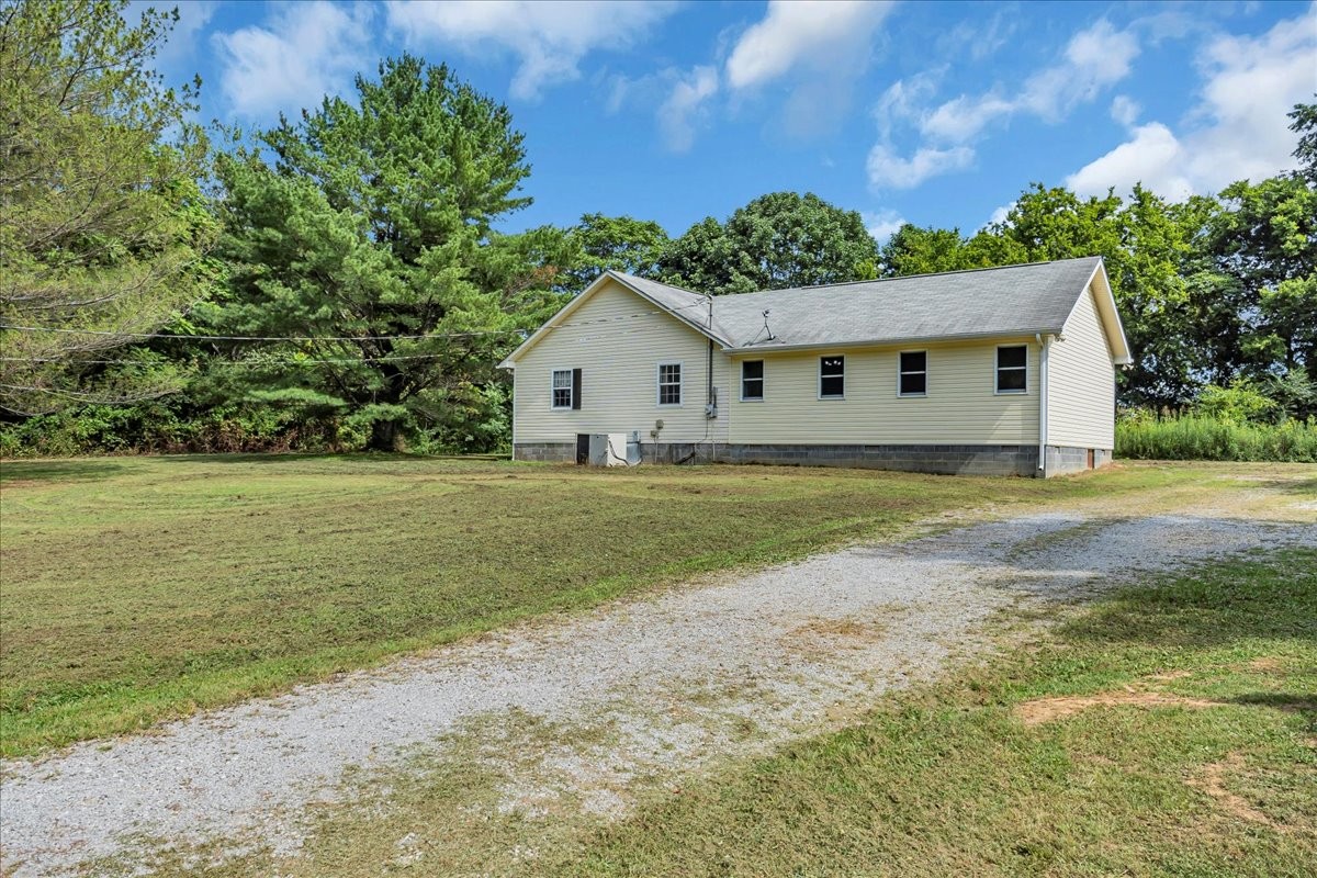 413 Walden Ridge Road Manchester, TN 37355 - Photo 9 of 71 a view of a house with a big yard