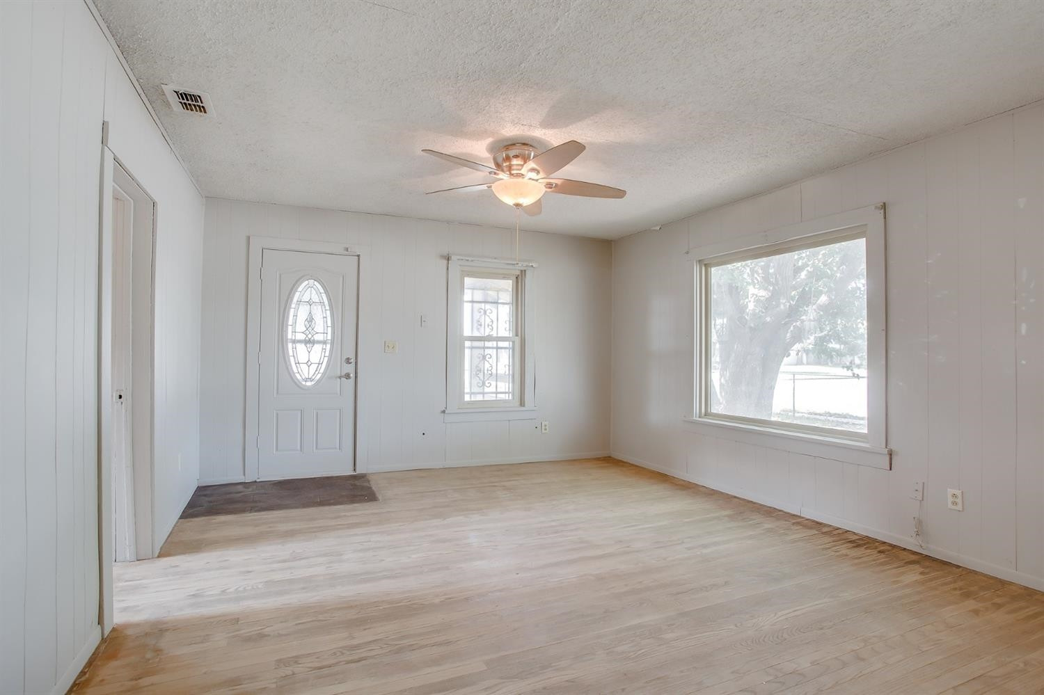 3114 Bates Street Lubbock, TX 79415 - Photo 3 of 15 Living room.