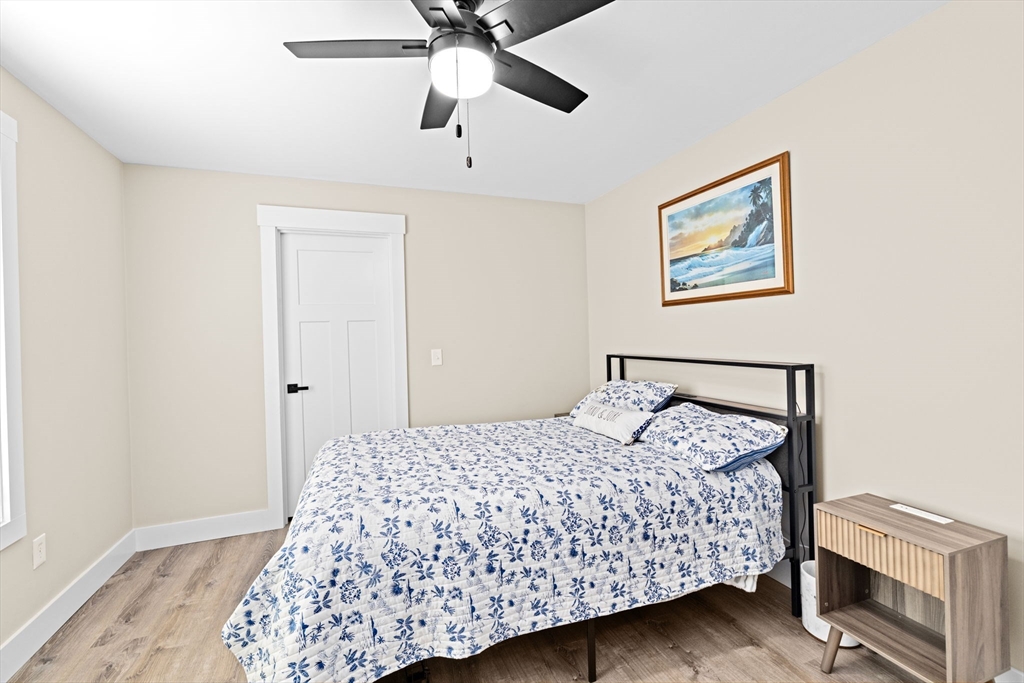 8 Big River Road Coventry, RI 02816 - Photo 25 of 42 a bedroom with a bed and a dresser