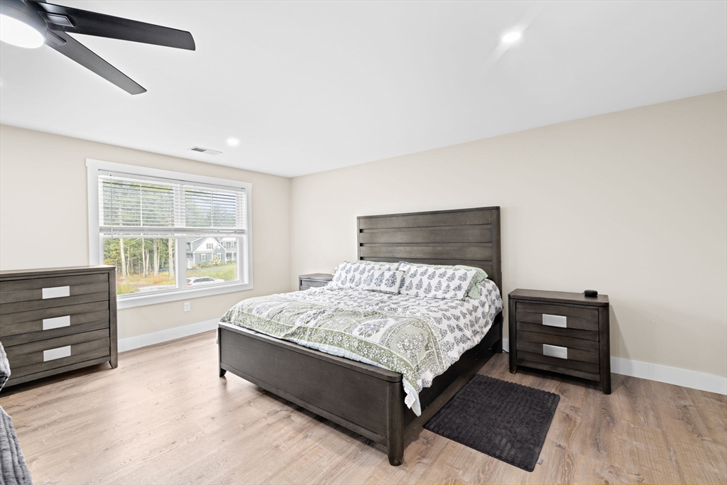 8 Big River Road Coventry, RI 02816 - Photo 29 of 42 a bed room with a bed and a window