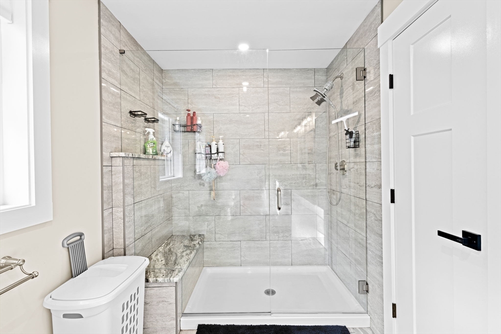 8 Big River Road Coventry, RI 02816 - Photo 32 of 42 a bathroom with a shower bathtub and a toilet