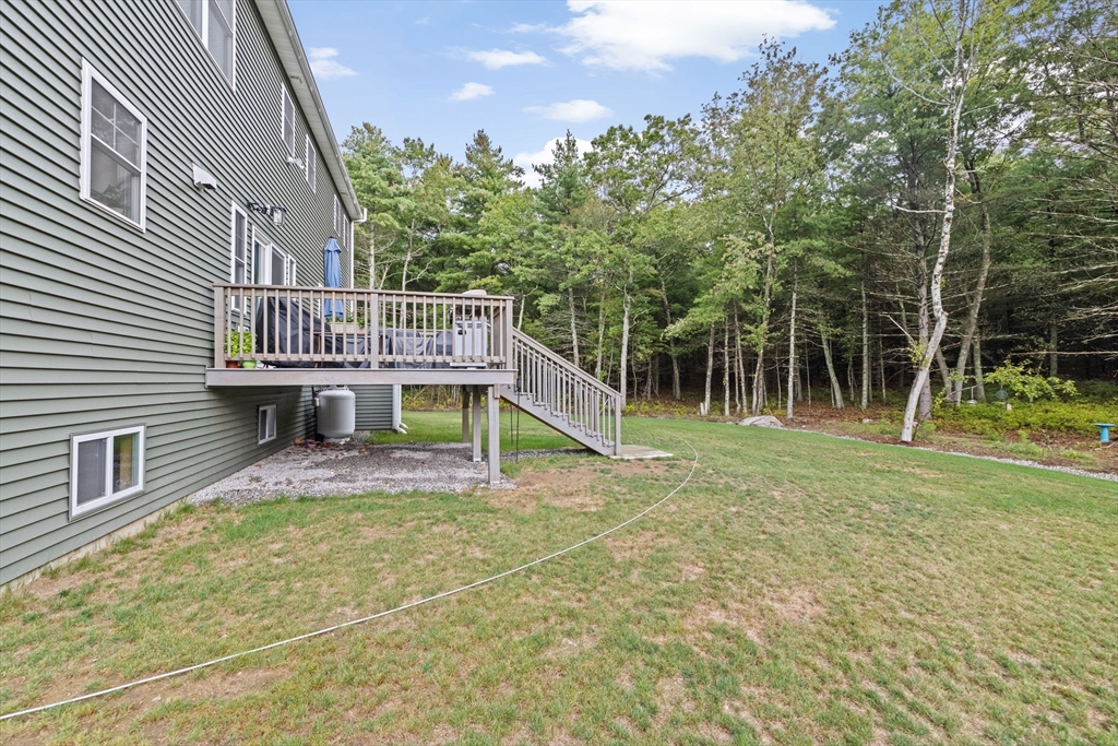8 Big River Road Coventry, RI 02816 - Photo 34 of 42 a view of a house with a backyard
