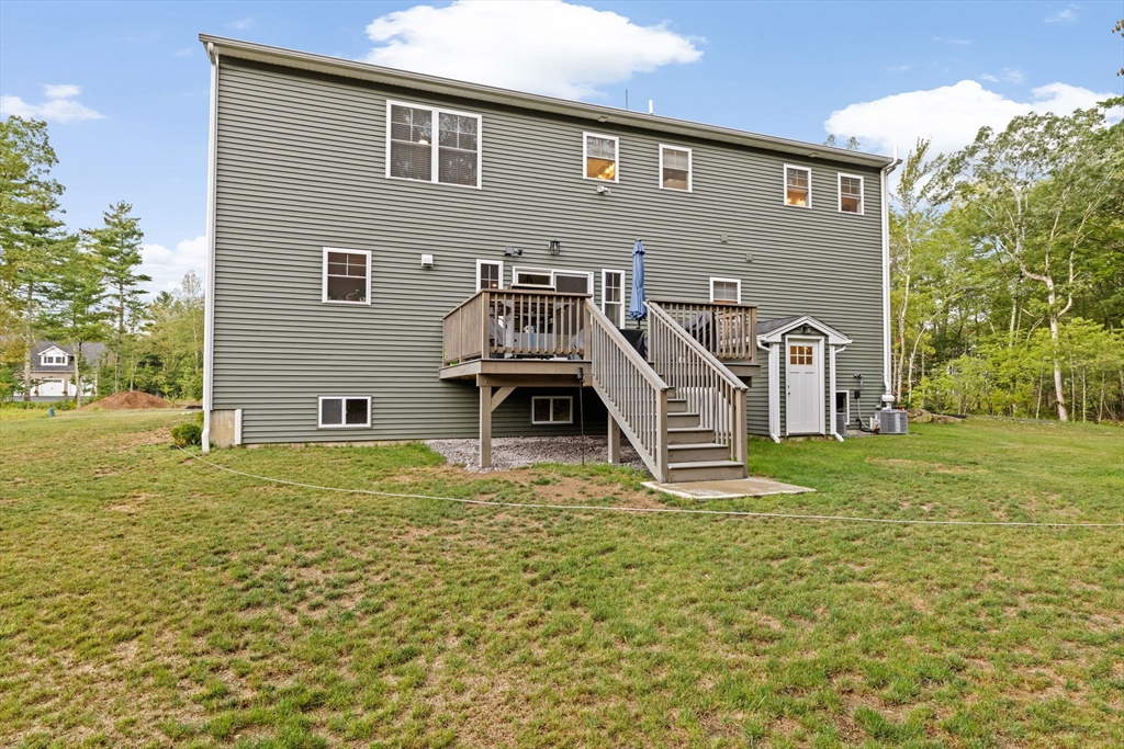 8 Big River Road Coventry, RI 02816 - Photo 35 of 42 a front view of a house with a yard