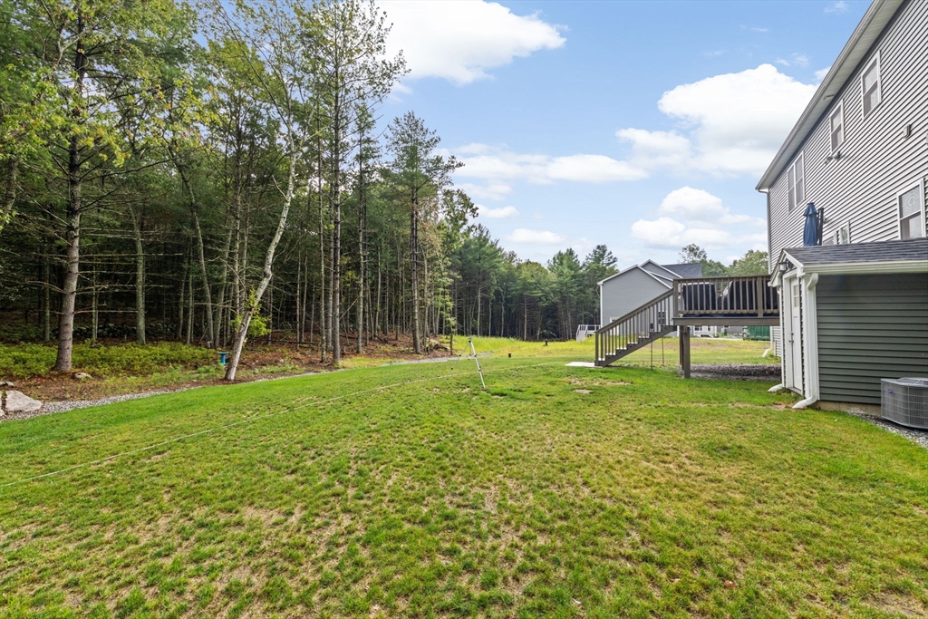 8 Big River Road Coventry, RI 02816 - Photo 36 of 42 a view of a garden with a slide