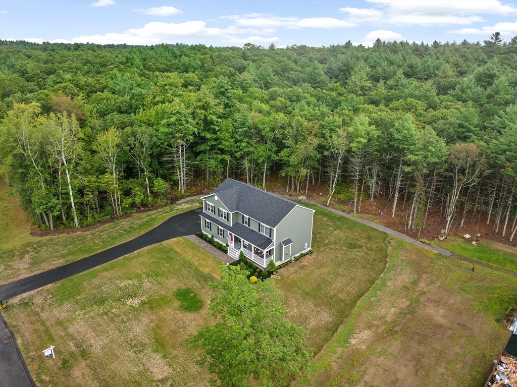 8 Big River Road Coventry, RI 02816 - Photo 40 of 42 a view of a lake with a yard
