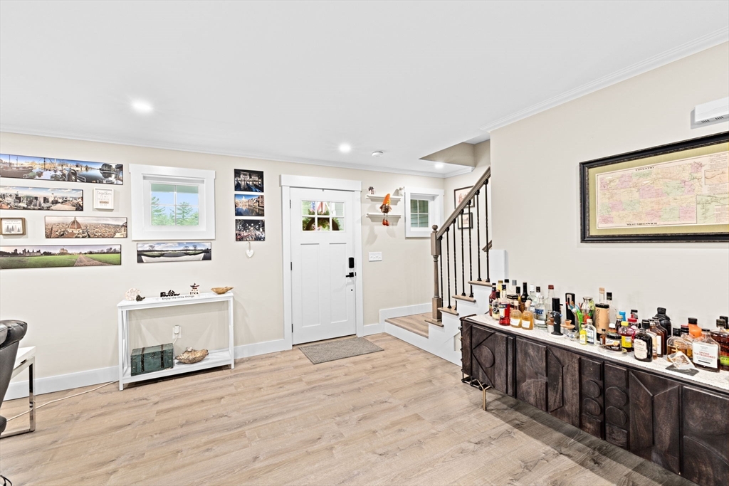 8 Big River Road Coventry, RI 02816 - Photo 6 of 42 a living room with stainless steel appliances kitchen island granite countertop a refrigerator and a stove top oven