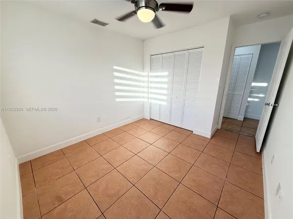 a view of a room with a window