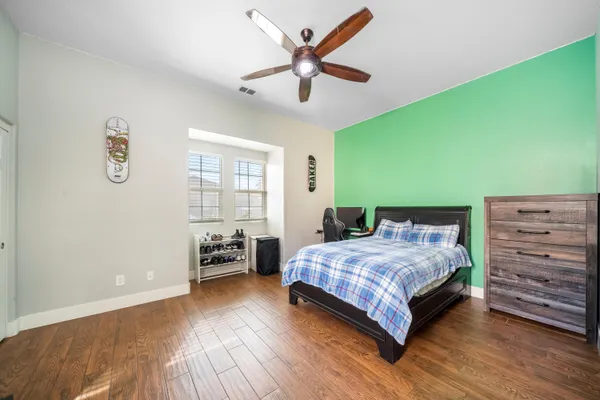 a bedroom with a bed and furniture