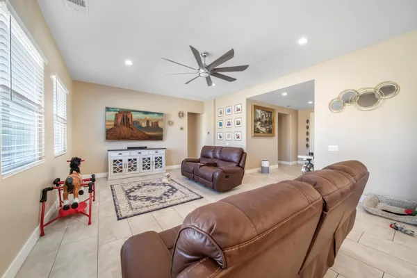 a bedroom with furniture and a bed