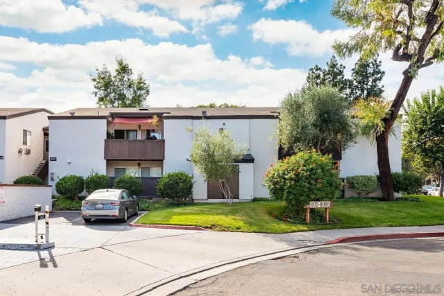 a house view with a garden space