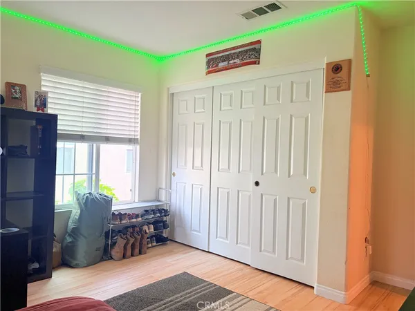 a bedroom with furniture and windows