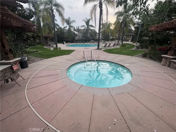 an outdoor space with trees in the background