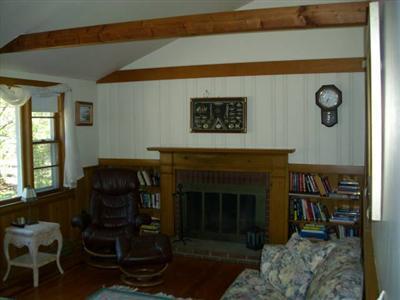 18 Edgewood Road Dennis Port, MA 02639 - Photo 11 of 21 a living room with furniture and a fireplace