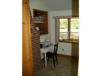 18 Edgewood Road Dennis Port, MA 02639 - Photo 14 of 21 a view of a chair and table in a room