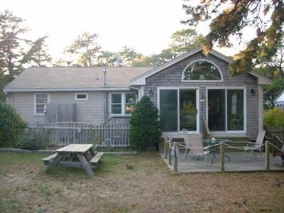 18 Edgewood Road Dennis Port, MA 02639 - Photo 2 of 21 a view of a house with a yard and sitting area