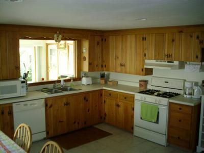18 Edgewood Road Dennis Port, MA 02639 - Photo 5 of 21 a kitchen with a sink stove and window