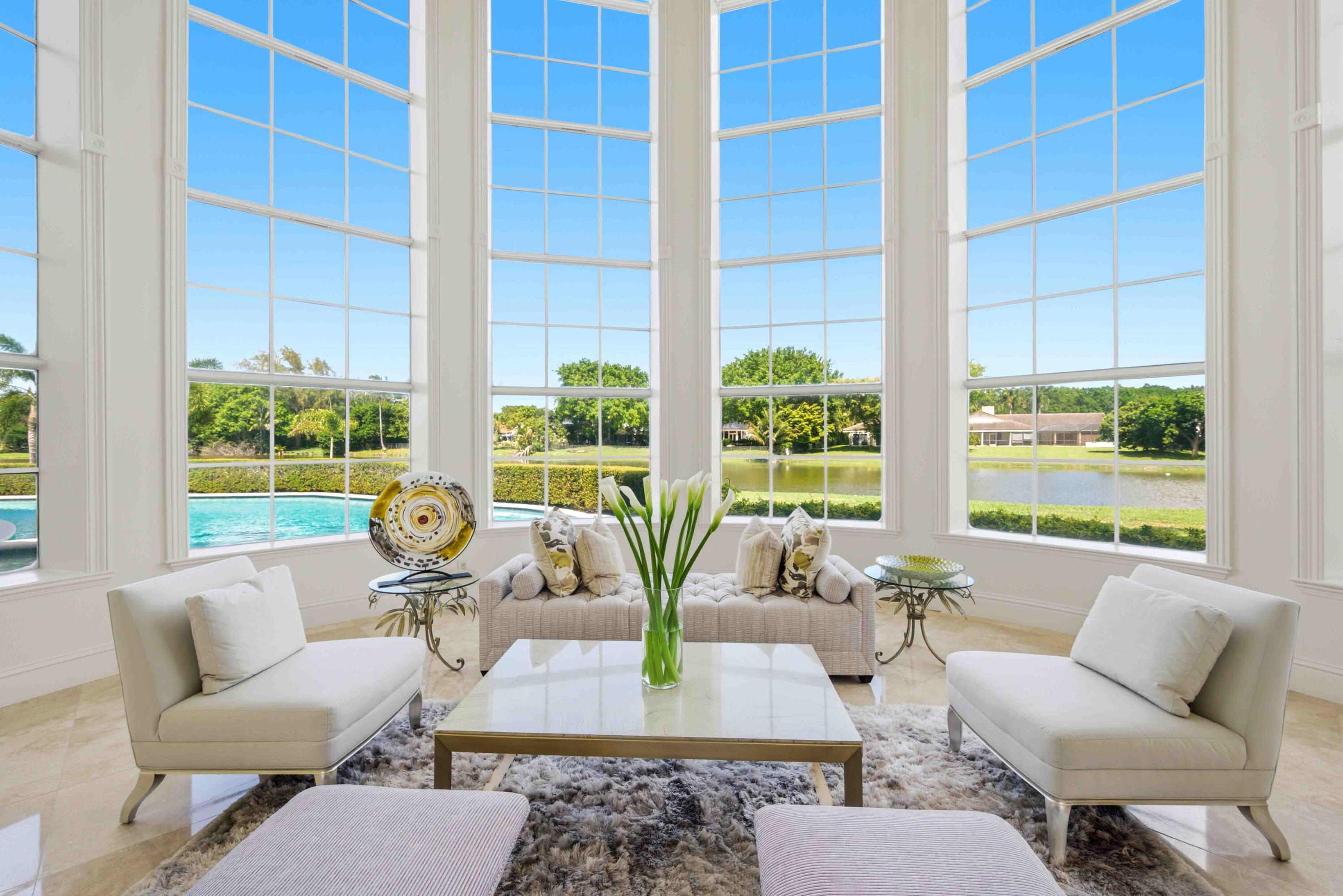 18118 Daybreak Drive Boca Raton, FL 33496 - Photo 14 of 84 a living room with furniture and a potted plant