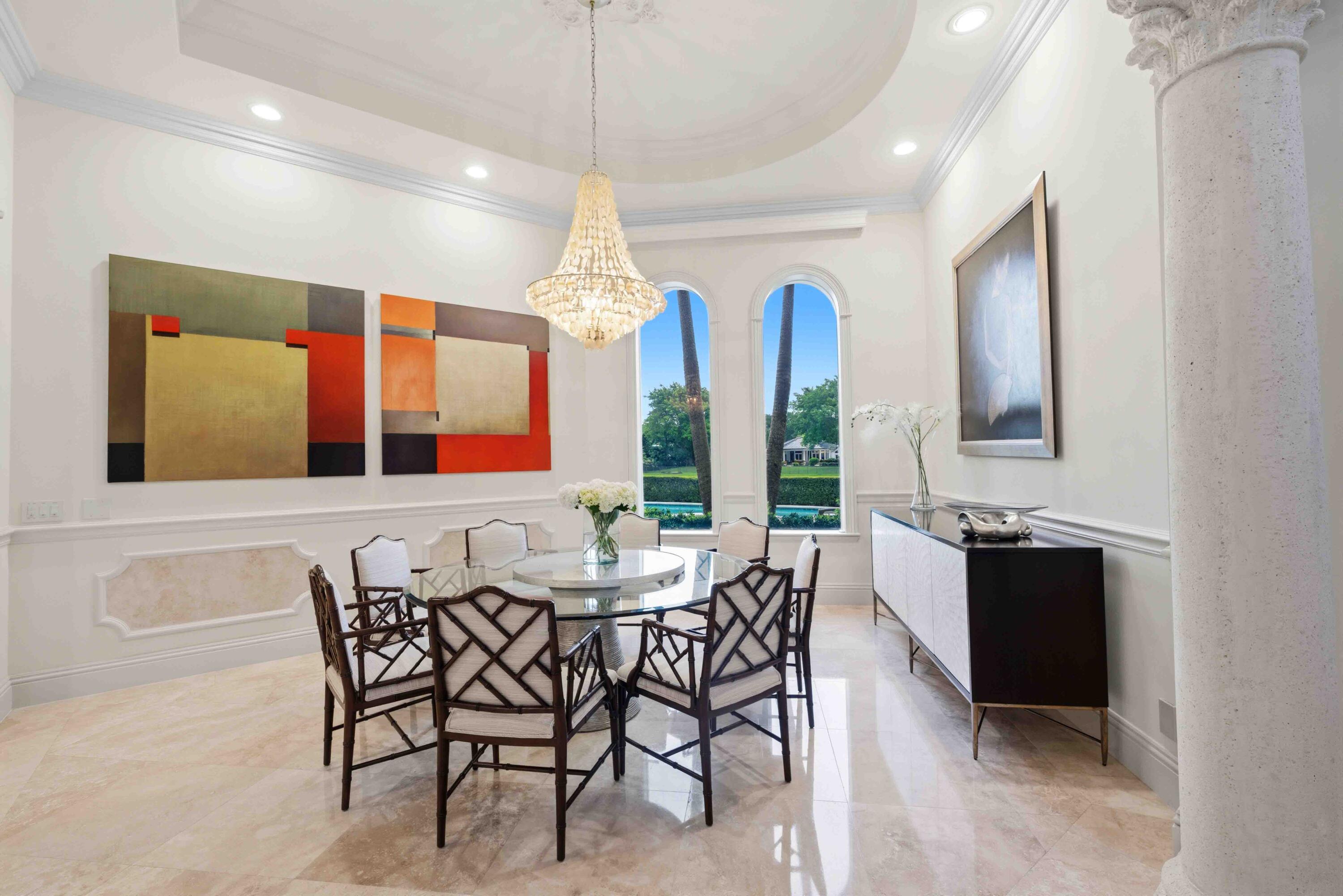 18118 Daybreak Drive Boca Raton, FL 33496 - Photo 18 of 84 a view of a dining room with furniture and chandelier